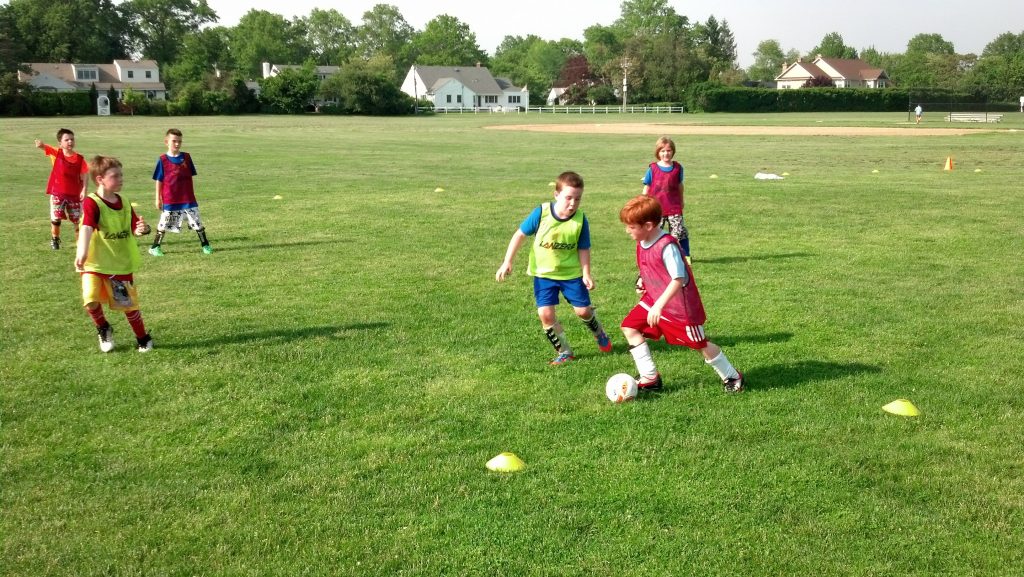 Boys playing streetbol.